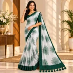 Bottle Green Floral Georgette Printed Saree with contrast border and pallu tassels